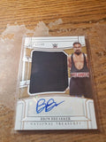 2022 Panini Chronicles National Treasures WWE Bron Breakker Relic RC Auto /49